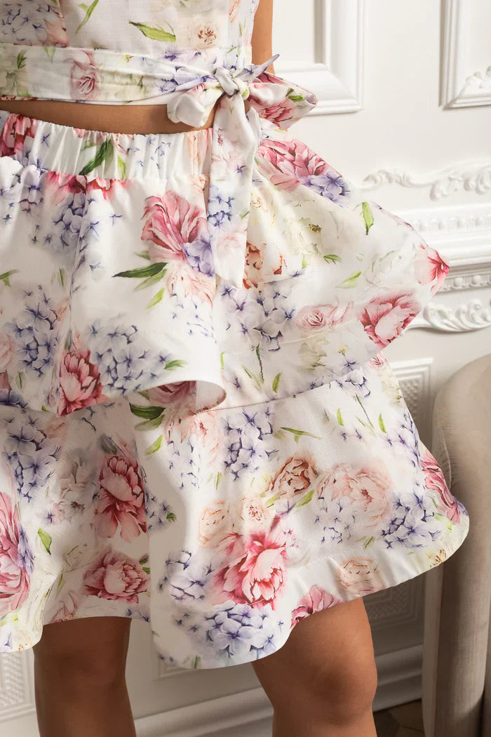 Conjunto – Top Estampado Sem Mangas + Saia Curta Plissada de Cintura Alta