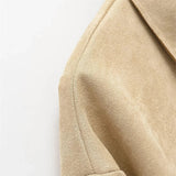 Casaco com Detalhes Vazados – Sofisticação Atemporal e Design Autoral