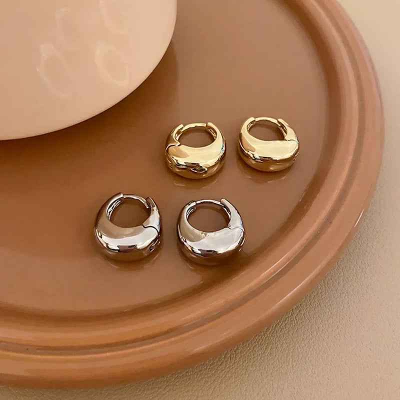 Argolas Grossas – Brilho Intenso em Aço Inoxidável